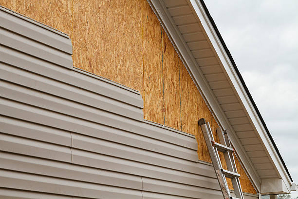 Professional Vinyl Siding technician working in Goshen, IN